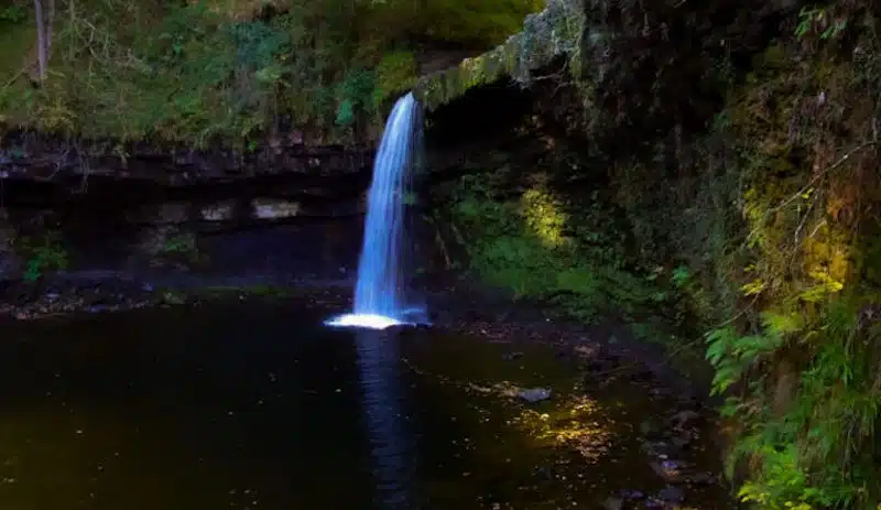 Located in the Brecon Beacons National Park in South Wales, Sgwd Gwladys, or Lady Falls, is part of the Waterfall Country walking trails.