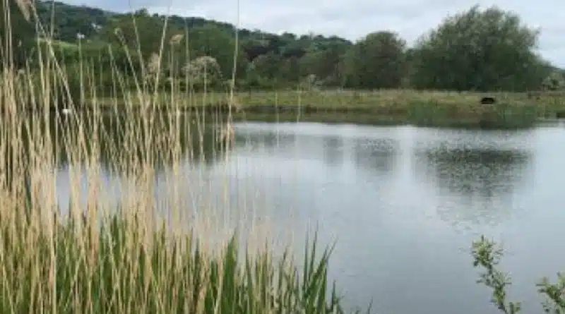 The 35 acre freshwater lake at Park in the Past in Wrexham, Wales
