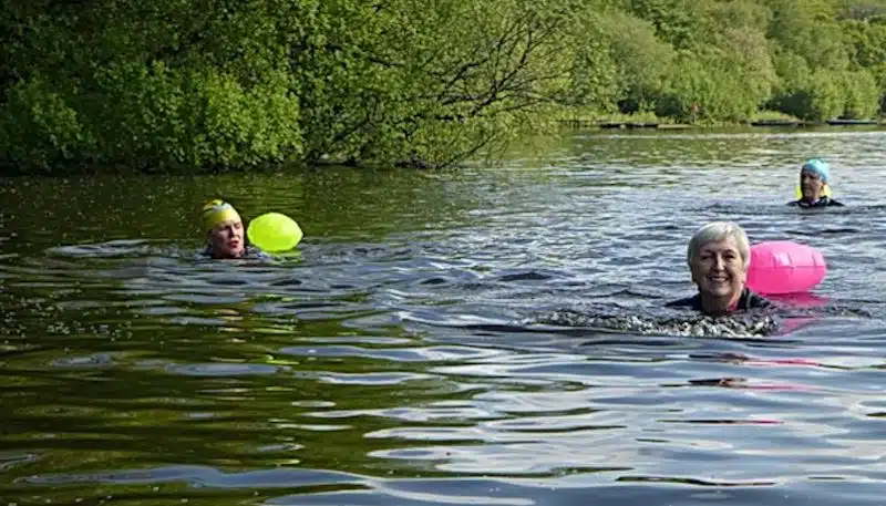 Swimmers in Wyresdale Park near Preston