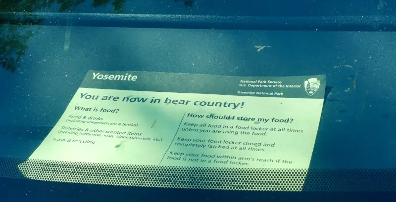 Yosemite warning notice to be kept in cars at all times to stop bears from smelling food in cars.